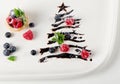 Sweet christmas tree with berries and mint