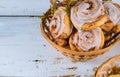 Sweet cinnamon buns with white glaze Royalty Free Stock Photo