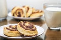 Sweet cinnamon rolls with milk Royalty Free Stock Photo