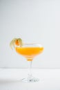 Sweet cocktail with peach liquor and physalis