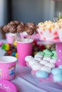 Sweet colored meringues, popcorn, custard cakes Royalty Free Stock Photo