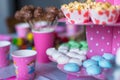 Sweet colored meringues, popcorn, custard cakes Royalty Free Stock Photo