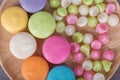 Sweet colorful cake macaron and Aalaw or Alua candy in plate on