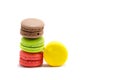 Sweet and Colorful four macaroons stacked togehter on white Royalty Free Stock Photo