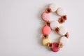 Figure eight from colorful french macaroons. March 8 concept, Women`s Day. copy space Royalty Free Stock Photo