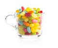 Sweet colorful jelly beans in glass cup Royalty Free Stock Photo