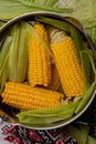 Sweet corn boil with salt. cooked sweet corn in pot on wooden table. Royalty Free Stock Photo