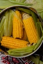 Sweet corn boil with salt. cooked sweet corn in pot on wooden table. Royalty Free Stock Photo