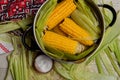 Sweet corn boil with salt. cooked sweet corn in pot on wooden table. Royalty Free Stock Photo