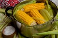 Sweet corn boil with salt. cooked sweet corn in pot on wooden table. Royalty Free Stock Photo