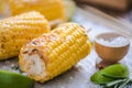 Sweet corn cob grilled served with salt Royalty Free Stock Photo