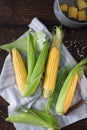 Sweet corn on the cob on wooden table Royalty Free Stock Photo