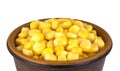 Sweet corn kernels in bowl over white Royalty Free Stock Photo
