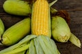 Sweet corn with some ears partially husked. Royalty Free Stock Photo