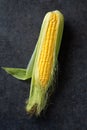 Sweet corns on a black table