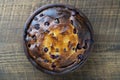 Sweet cottage cheese casserole with red cherry and semolina on wooden table. Ceramic bowl with baked cottage cheese casserole ,