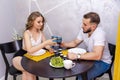 Sweet couple having a romantic dinner. Celebrating Valentine Day. Royalty Free Stock Photo