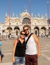 Sweet couple in love taking a selfie in Venice Italy while traveling around europe Royalty Free Stock Photo