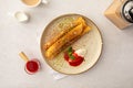 Sweet crepe roll with cream and jam Royalty Free Stock Photo