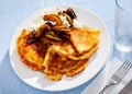 Sweet crepes with cottage cheese and baked apples with cinnamon Royalty Free Stock Photo