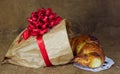 Sweet croissants with chocolate Christmas present Royalty Free Stock Photo