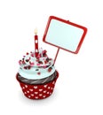 Sweet cupcake with candle and blank board on white