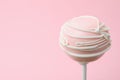 Sweet decorated cake pop on pink background