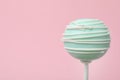 Sweet decorated cake pop on background, space for text