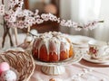 Sweet delicious festive Easter cake with white glaze, colorful Easter eggs, in a decorative plate