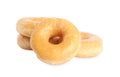 Sweet delicious glazed donuts on background