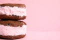Sweet delicious ice cream cookie sandwiches on color background, closeup Royalty Free Stock Photo