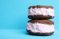 Sweet delicious ice cream cookie sandwiches, closeup. Space for text Royalty Free Stock Photo