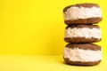 Sweet delicious ice cream cookie sandwiches on color background Royalty Free Stock Photo