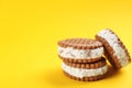 Sweet delicious ice cream cookie sandwiches on background. Space for text Royalty Free Stock Photo