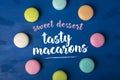 Sweet dessert. Cake macaron or macaroon on a blue background. Royalty Free Stock Photo