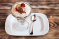 Sweet dessert - chocolate and vanilla pudding in glasses served