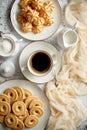 Sweet dessert concept. Golden crunchy cookies served with cup of black coffee Royalty Free Stock Photo