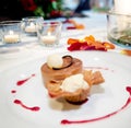 Sweet dessert dish, romantic restaurant table ready with ice cream and cookies Royalty Free Stock Photo