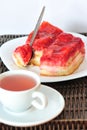 Sweet dessert: strawberry cake and fruit tea