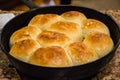 Sweet dinner rolls on thanksgiving morning in cast Iron skillet