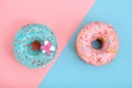 Sweet donuts, blue on pink, pink on blue. Concept conflict of contradictions, individuality in the generalization, the