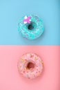 Sweet donuts, blue on pink, pink on blue. Concept conflict of contradictions, individuality in the generalization, the