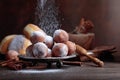 Sweet donuts with cinnamon sticks powdered with sugar.