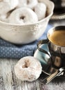 Sweet donuts with icing sugar and cup of coffee Royalty Free Stock Photo