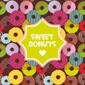 Sweet donuts set with icing and sprinkls, frame for text, brown background