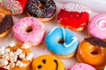 Sweet doughnuts on gray stone background Royalty Free Stock Photo