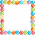 Sweet dragee display Rainbow colored candies with multicolored glaze, close up