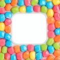 Sweet dragee display Rainbow colored candies with multicolored glaze, close up