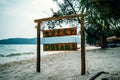 sweet dreams inscription on a wooden Board the name of the hotel and the beach on a tropical island.. Koh Rong Samloem, Saracen