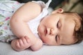 Sweet dreams, little one. an adorable baby girl sleeping on the bed at home. Royalty Free Stock Photo